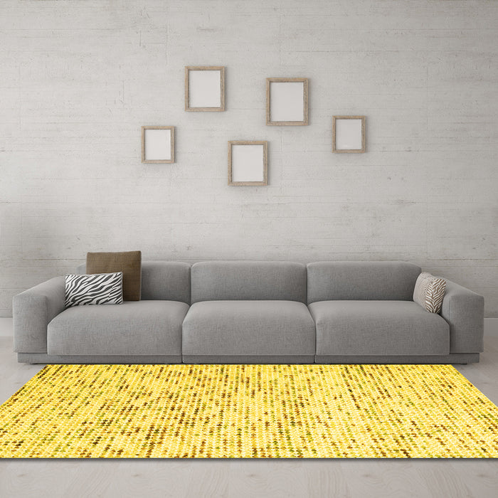 Machine Washable Solid Yellow Modern Rug in a Living Room, wshcon2100yw