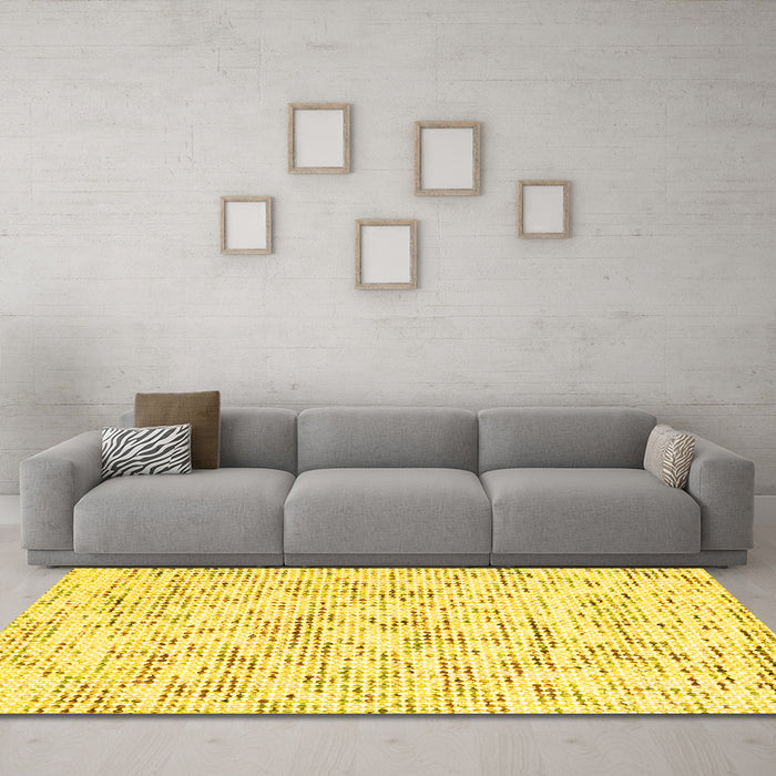 Machine Washable Solid Yellow Modern Rug in a Living Room, wshcon2101yw