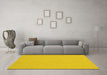 Machine Washable Solid Yellow Modern Rug in a Living Room, wshcon210yw