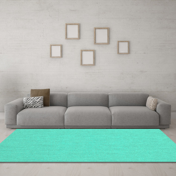 Machine Washable Solid Turquoise Modern Area Rugs in a Living Room,, wshcon210turq