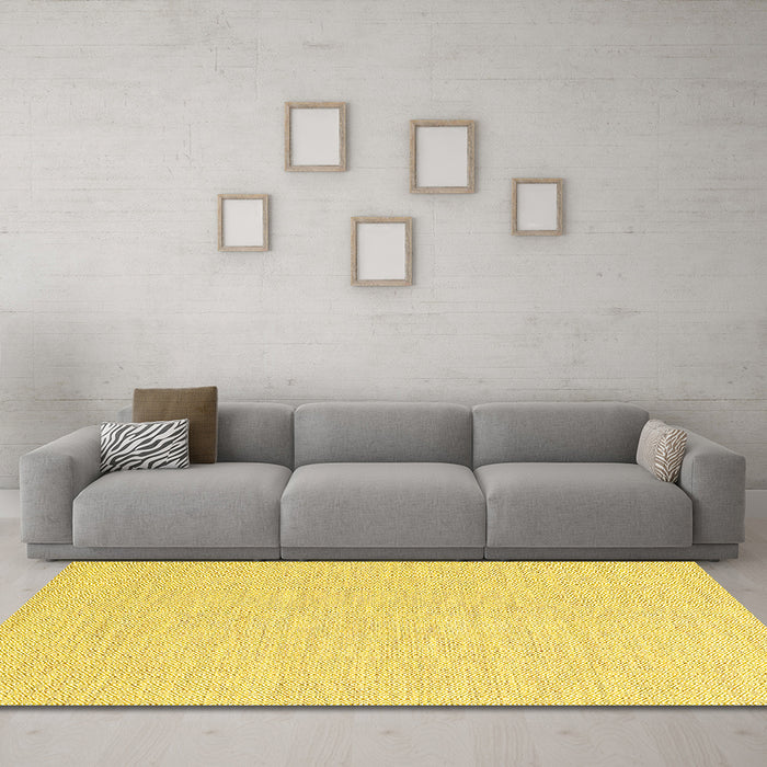 Machine Washable Solid Yellow Modern Rug in a Living Room, wshcon2121yw
