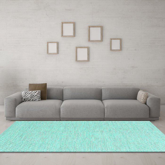 Machine Washable Solid Turquoise Modern Area Rugs in a Living Room,, wshcon2121turq