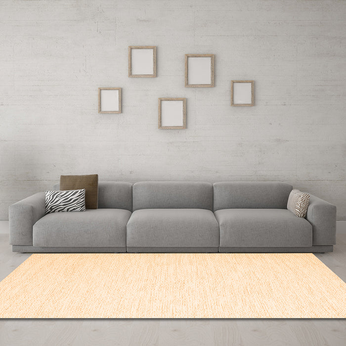 Machine Washable Solid Orange Modern Area Rugs in a Living Room, wshcon2123org