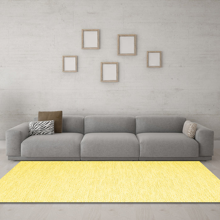 Machine Washable Solid Yellow Modern Rug in a Living Room, wshcon2123yw