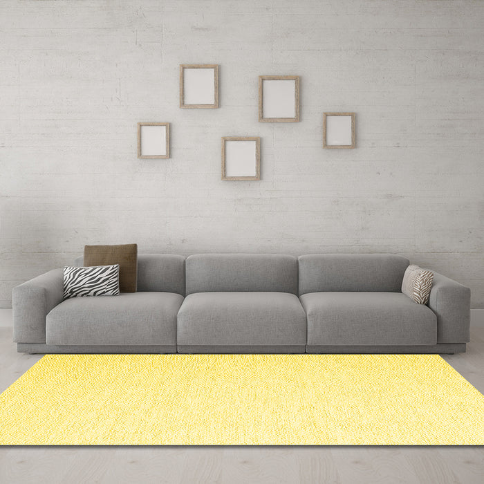 Machine Washable Solid Yellow Modern Rug in a Living Room, wshcon2137yw