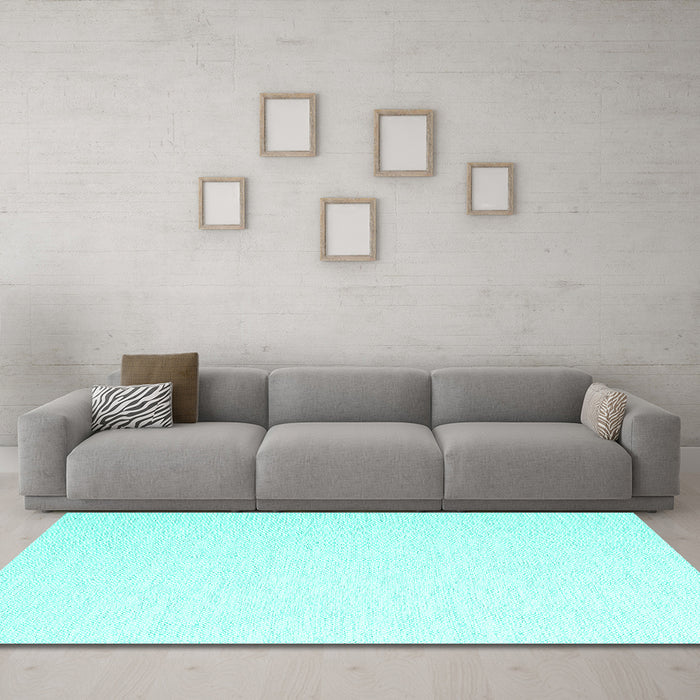 Machine Washable Solid Turquoise Modern Area Rugs in a Living Room,, wshcon2137turq