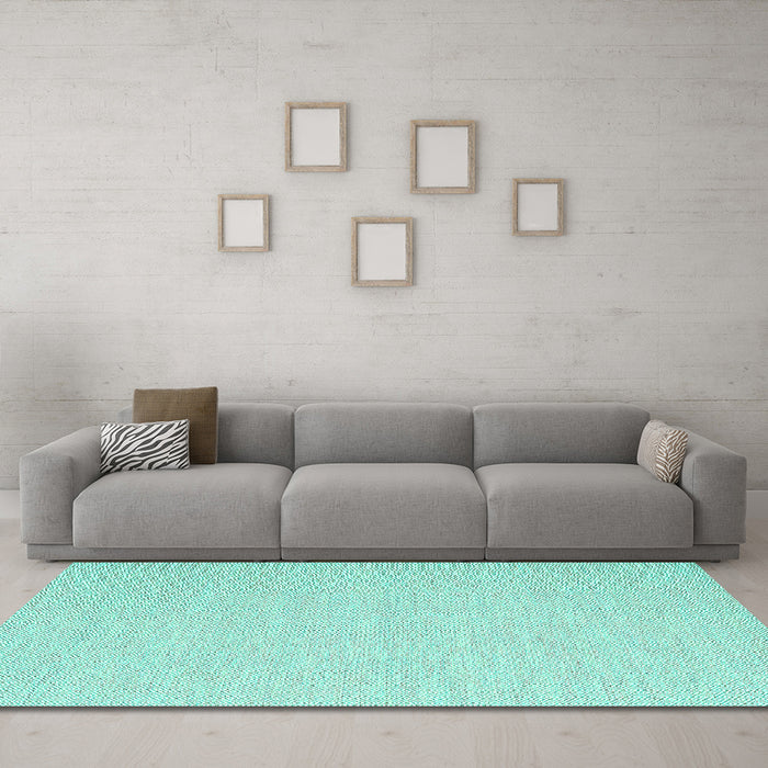 Machine Washable Solid Turquoise Modern Area Rugs in a Living Room,, wshcon2141turq