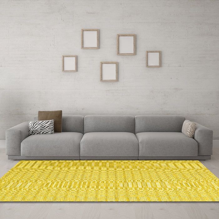 Machine Washable Solid Yellow Modern Rug in a Living Room, wshcon2158yw