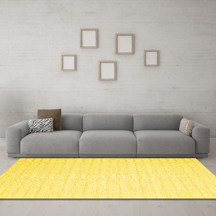 Machine Washable Solid Yellow Modern Rug in a Living Room, wshcon2162yw