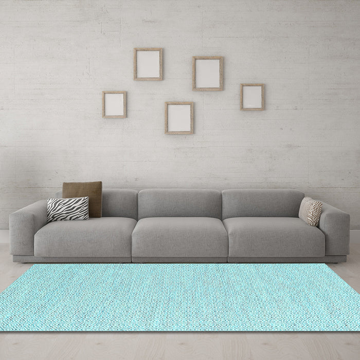 Machine Washable Solid Light Blue Modern Rug in a Living Room, wshcon2183lblu