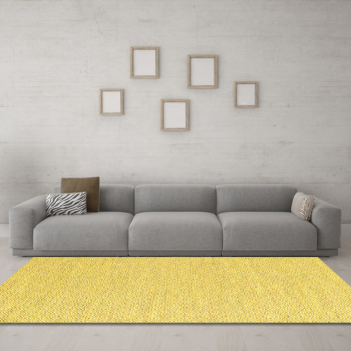 Machine Washable Solid Yellow Modern Rug in a Living Room, wshcon2183yw