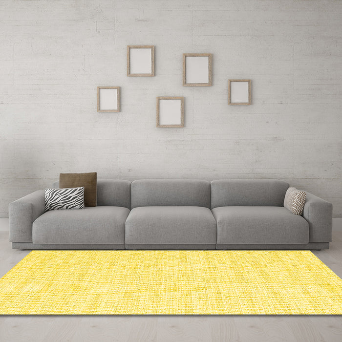 Machine Washable Solid Yellow Modern Rug in a Living Room, wshcon2187yw