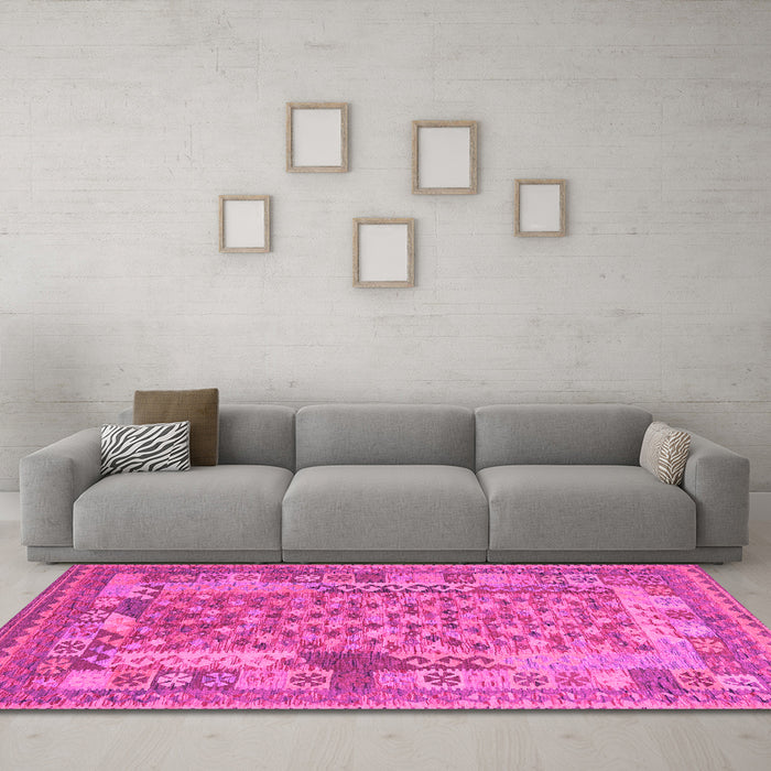 Machine Washable Oriental Pink Traditional Rug in a Living Room, wshcon2197pnk