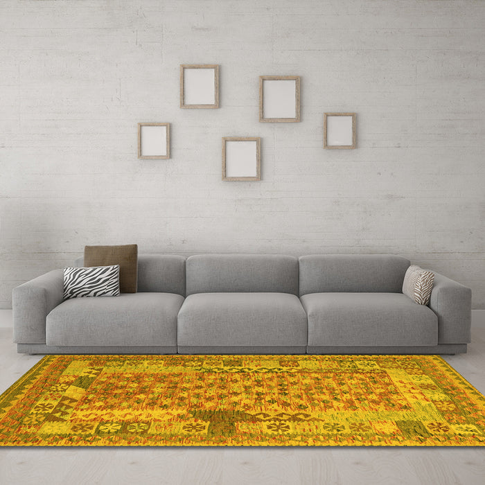 Machine Washable Oriental Yellow Traditional Rug in a Living Room, wshcon2197yw