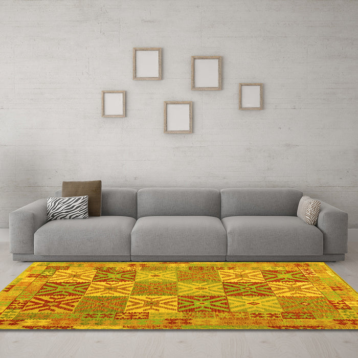 Machine Washable Southwestern Yellow Country Rug in a Living Room, wshcon2200yw