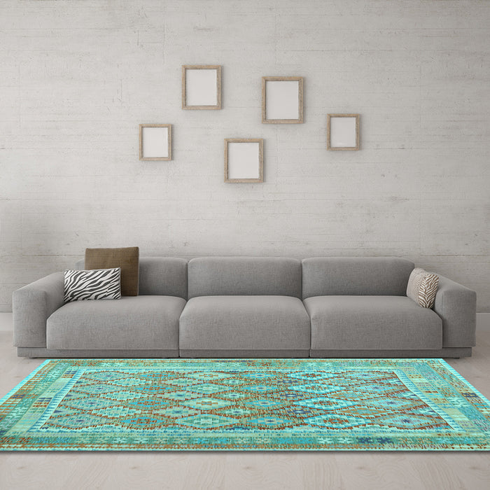 Machine Washable Oriental Light Blue Traditional Rug in a Living Room, wshcon2205lblu