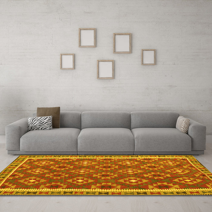 Machine Washable Oriental Yellow Traditional Rug in a Living Room, wshcon2215yw