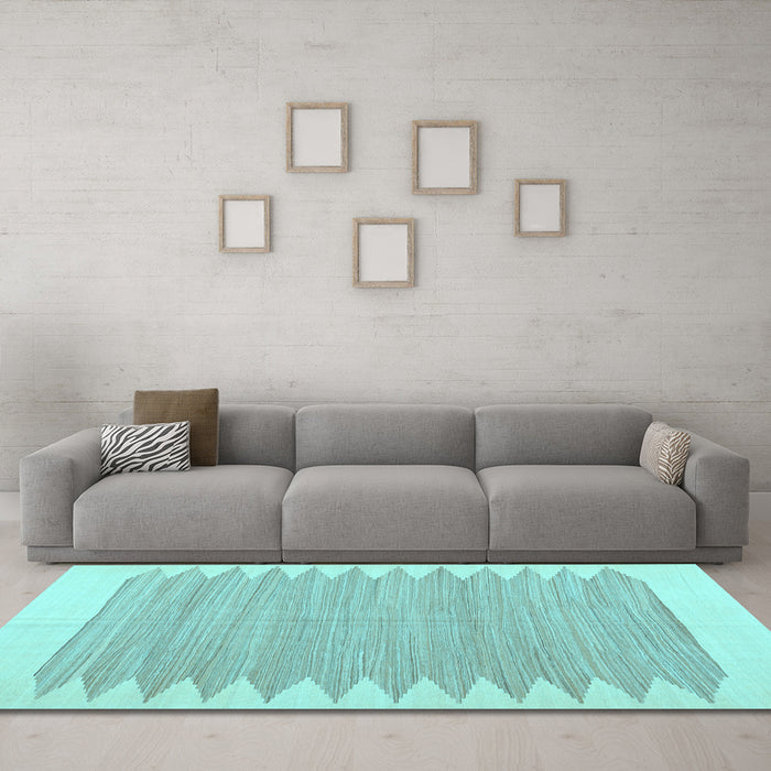 Machine Washable Solid Light Blue Modern Rug in a Living Room, wshcon2218lblu
