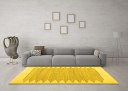 Machine Washable Solid Yellow Modern Rug in a Living Room, wshcon2218yw