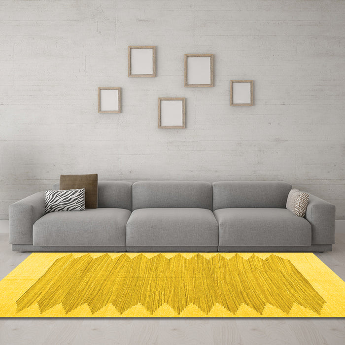 Machine Washable Solid Yellow Modern Rug in a Living Room, wshcon2218yw