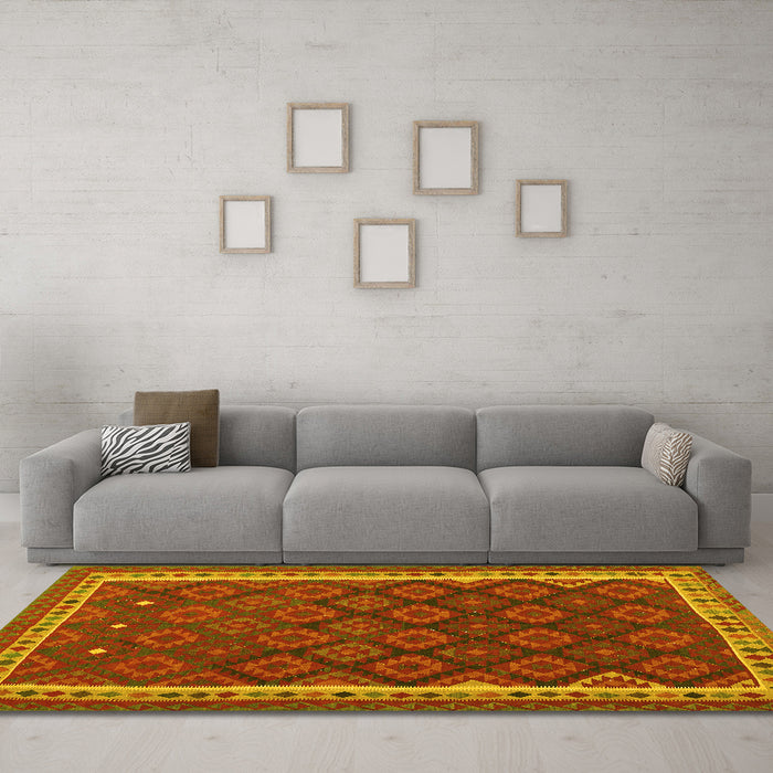 Machine Washable Oriental Yellow Traditional Rug in a Living Room, wshcon2247yw