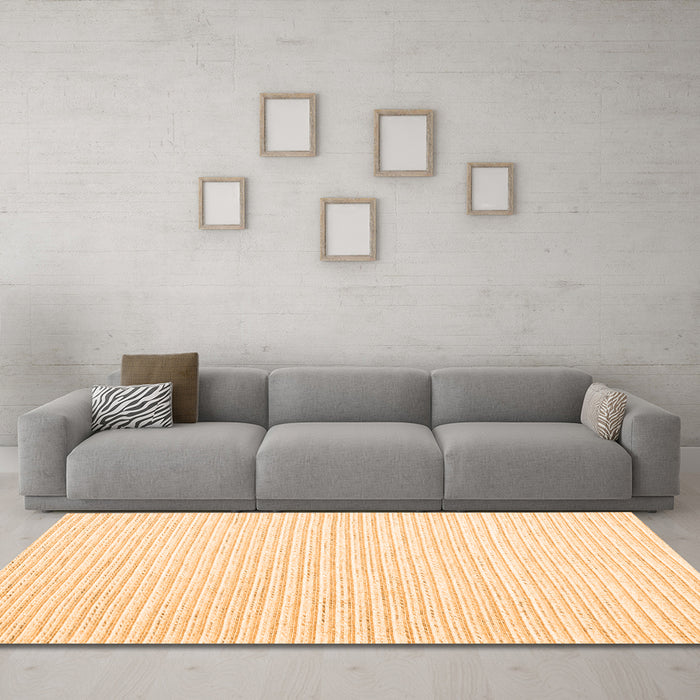 Machine Washable Solid Orange Modern Area Rugs in a Living Room, wshcon2249org