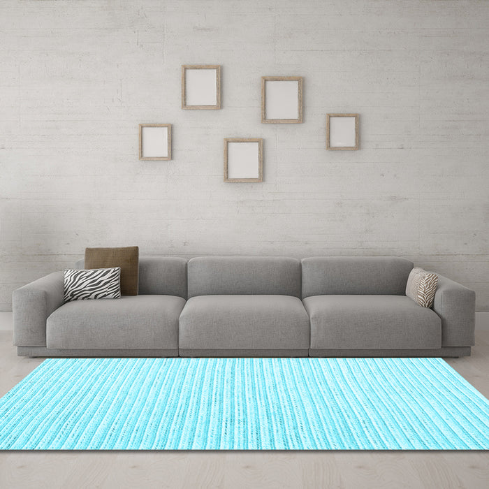 Machine Washable Solid Light Blue Modern Rug in a Living Room, wshcon2249lblu
