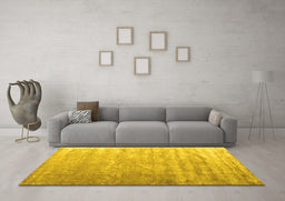 Machine Washable Solid Yellow Modern Rug in a Living Room, wshcon2261yw