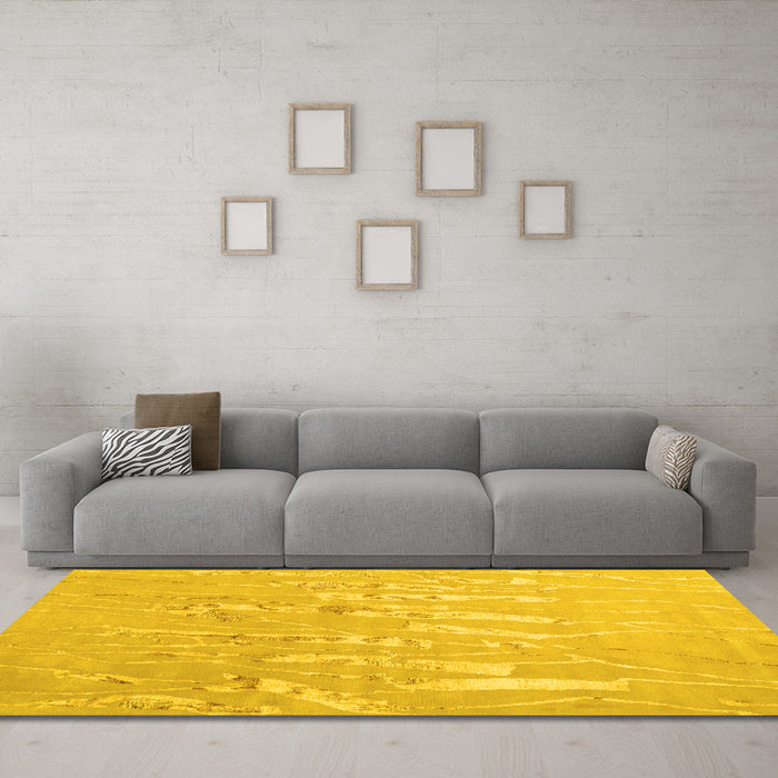 Machine Washable Solid Yellow Modern Rug in a Living Room, wshcon2265yw