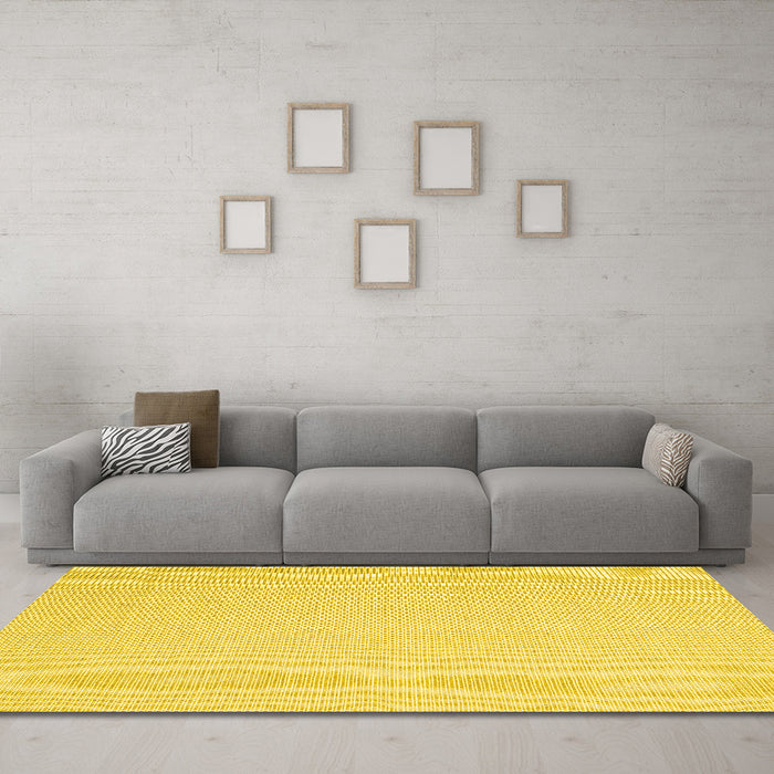 Machine Washable Solid Yellow Modern Rug in a Living Room, wshcon2267yw