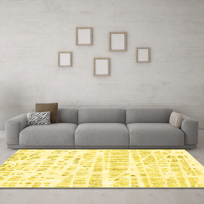 Machine Washable Solid Yellow Modern Rug in a Living Room, wshcon2297yw