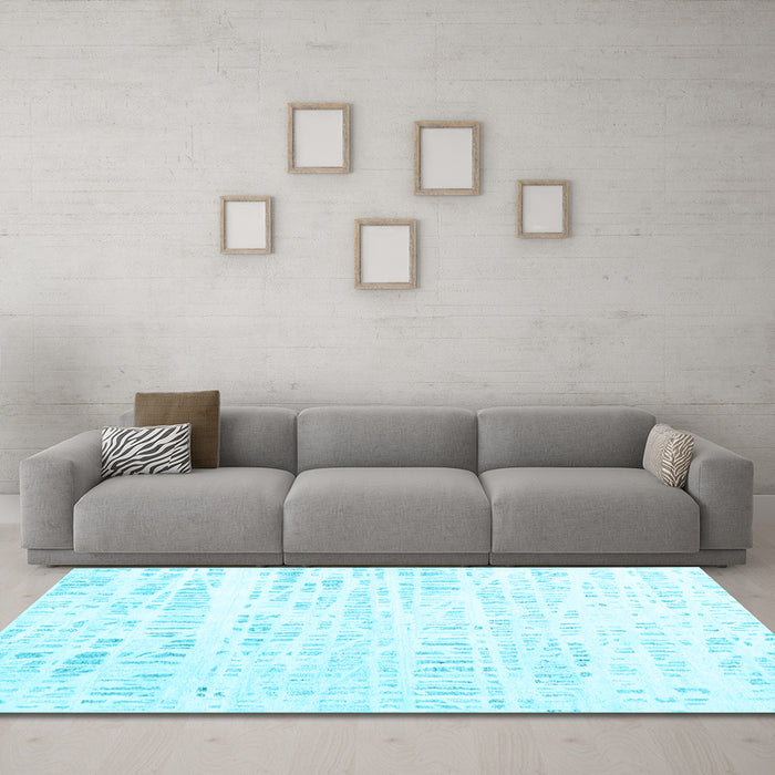 Machine Washable Solid Light Blue Modern Rug in a Living Room, wshcon2302lblu