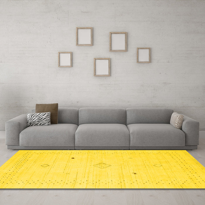 Machine Washable Solid Yellow Modern Rug in a Living Room, wshcon2304yw