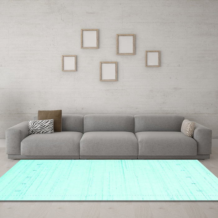 Machine Washable Solid Turquoise Modern Area Rugs in a Living Room,, wshcon2309turq