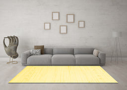 Machine Washable Solid Yellow Modern Rug in a Living Room, wshcon2309yw