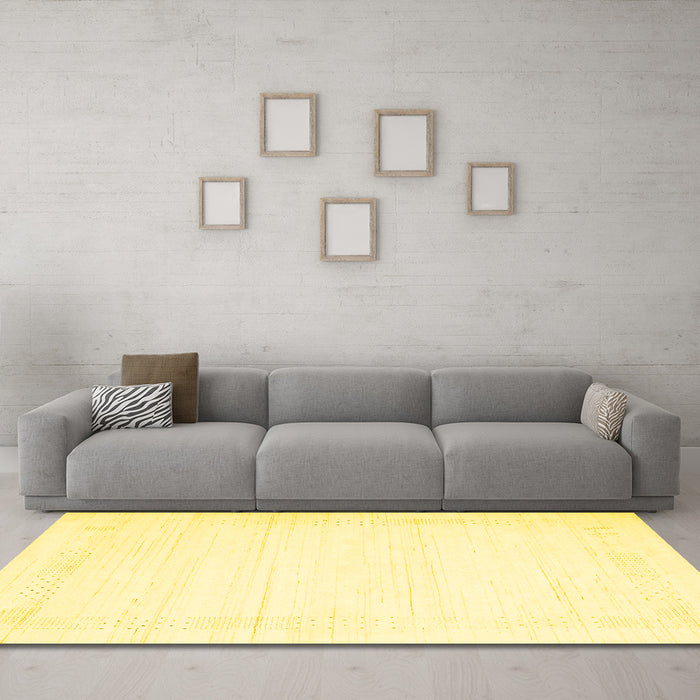 Machine Washable Solid Yellow Modern Rug in a Living Room, wshcon2322yw