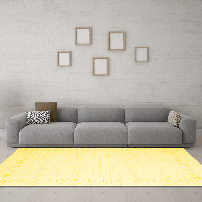 Machine Washable Solid Yellow Modern Rug in a Living Room, wshcon2325yw