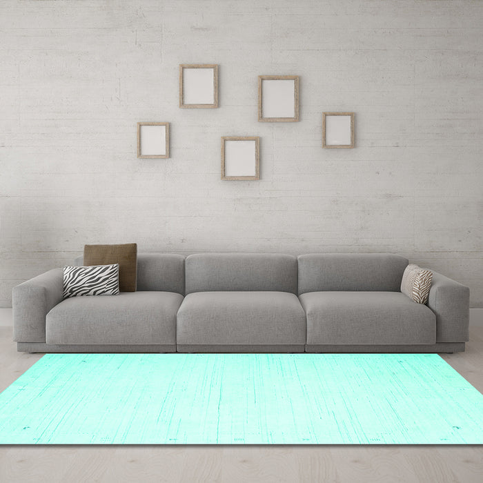 Machine Washable Solid Turquoise Modern Area Rugs in a Living Room,, wshcon2326turq