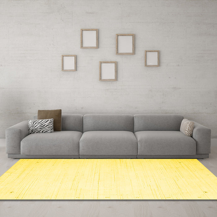 Machine Washable Solid Yellow Modern Rug in a Living Room, wshcon2326yw