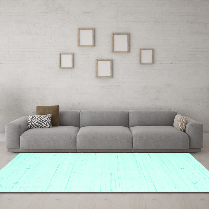 Machine Washable Solid Turquoise Modern Area Rugs in a Living Room,, wshcon2343turq