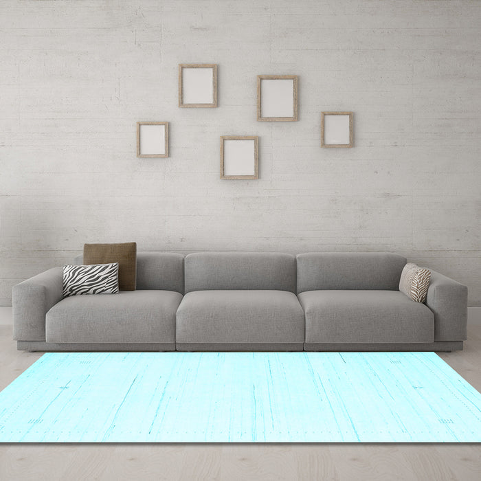 Machine Washable Solid Light Blue Modern Rug in a Living Room, wshcon2343lblu