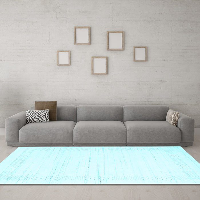 Machine Washable Solid Light Blue Modern Rug in a Living Room, wshcon2346lblu