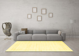 Machine Washable Solid Yellow Modern Rug in a Living Room, wshcon2346yw