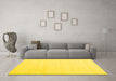 Machine Washable Solid Yellow Modern Rug in a Living Room, wshcon2373yw