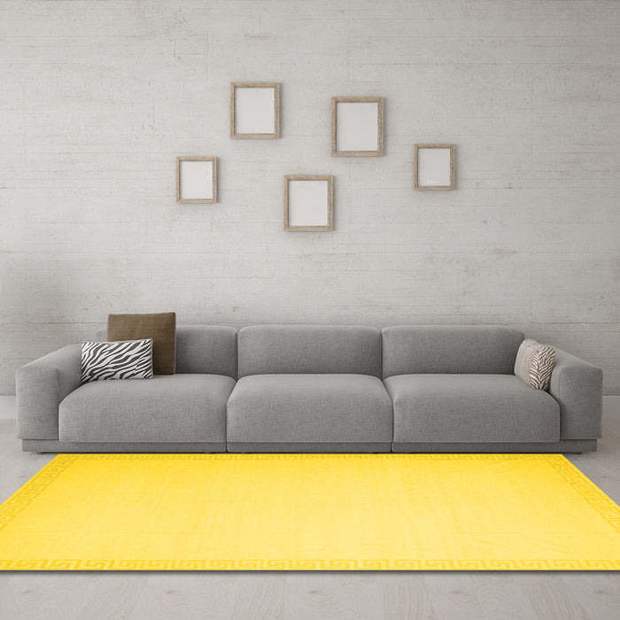 Machine Washable Solid Yellow Modern Rug in a Living Room, wshcon2377yw