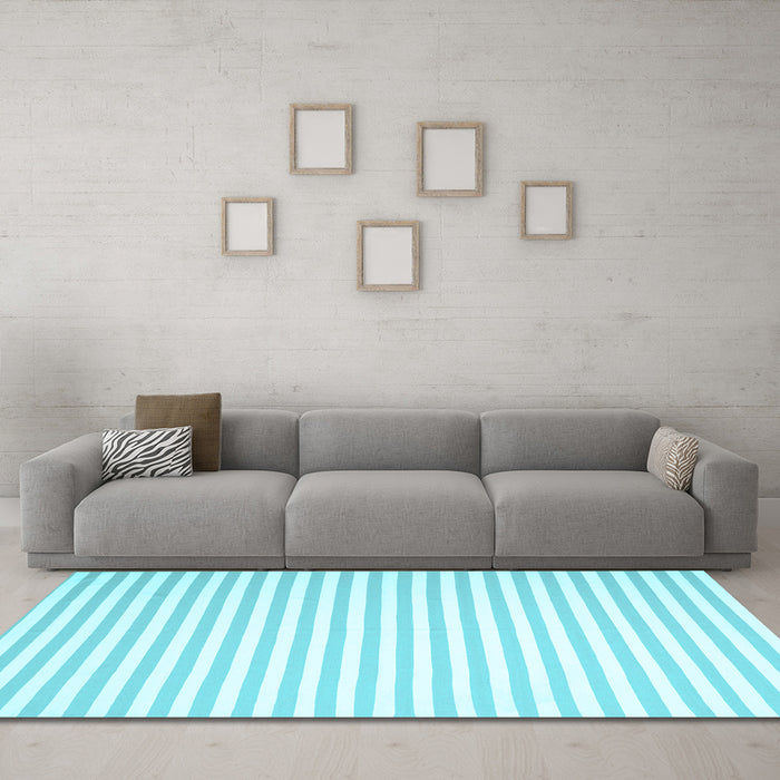Machine Washable Solid Light Blue Modern Rug in a Living Room, wshcon2388lblu