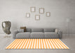 Machine Washable Solid Orange Modern Area Rugs in a Living Room, wshcon2388org