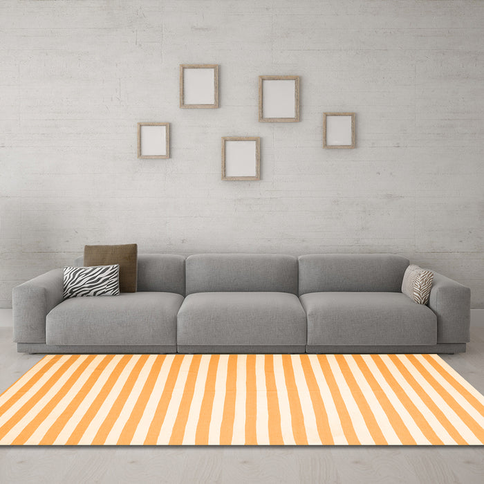 Machine Washable Solid Orange Modern Area Rugs in a Living Room, wshcon2388org
