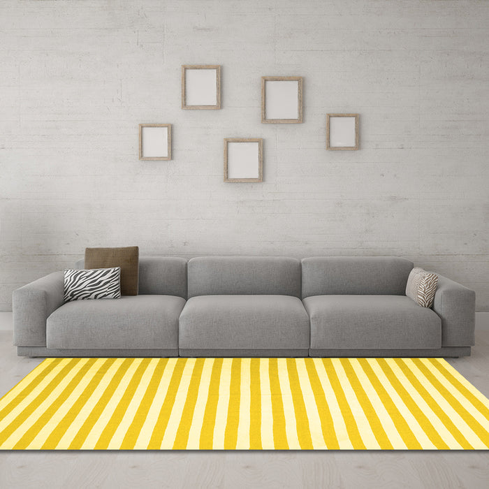 Machine Washable Solid Yellow Modern Rug in a Living Room, wshcon2388yw