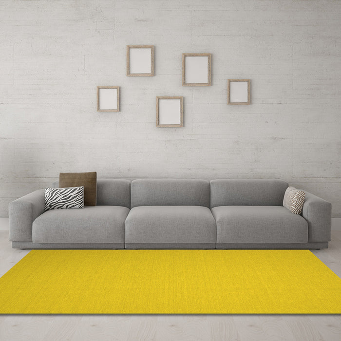 Machine Washable Solid Yellow Modern Rug in a Living Room, wshcon239yw